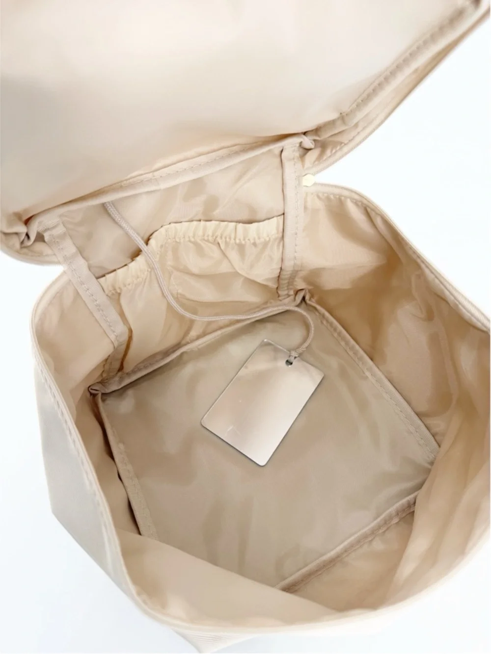 La Mer and Nuxe Zippered Cosmetic Pouches